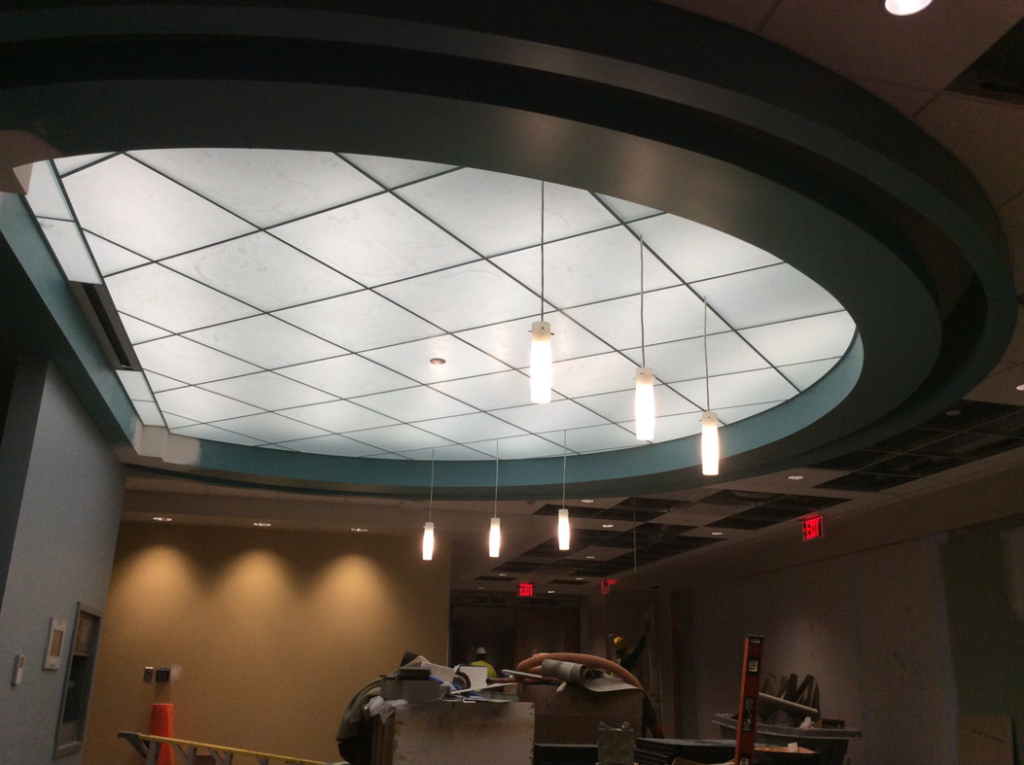 A commercial interior renovation project with a unique ceiling design and new lighting by Combs Interior Specialties in Columbus, OH.