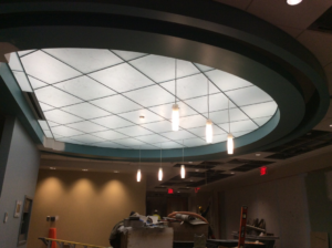 A commercial interior renovation project with a unique ceiling design and new lighting by Combs Interior Specialties in Columbus, OH.