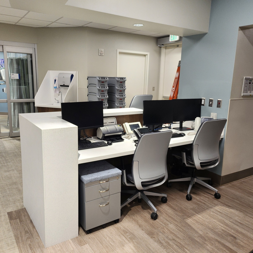 A newly constructed or renovated commercial office reception area by LEMA Construction, Inc. in Saint Petersburg, FL.
