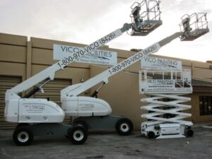 Commercial painting equipment, including boom and scissor lifts, for Vico Painting Contractors in Hialeah, FL