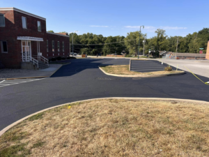A commercial asphalt parking lot freshly sealcoated by Gorman sealcoating & striping in Blue Springs, MO.