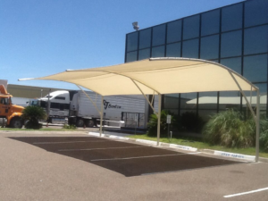 A commercial parking lot shade structure installed by Laredo Shades, a general contractor in Laredo, TX.