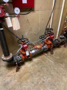 Large commercial plumbing valves and piping system maintained by JF Plumbing & Heating in Rockville, MD.