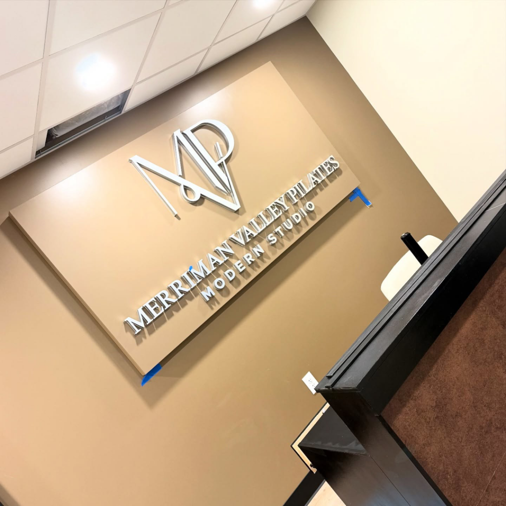 Professional commercial sign installation for a business by Crystal Contracting LLC, a handyman in Clinton, OH.