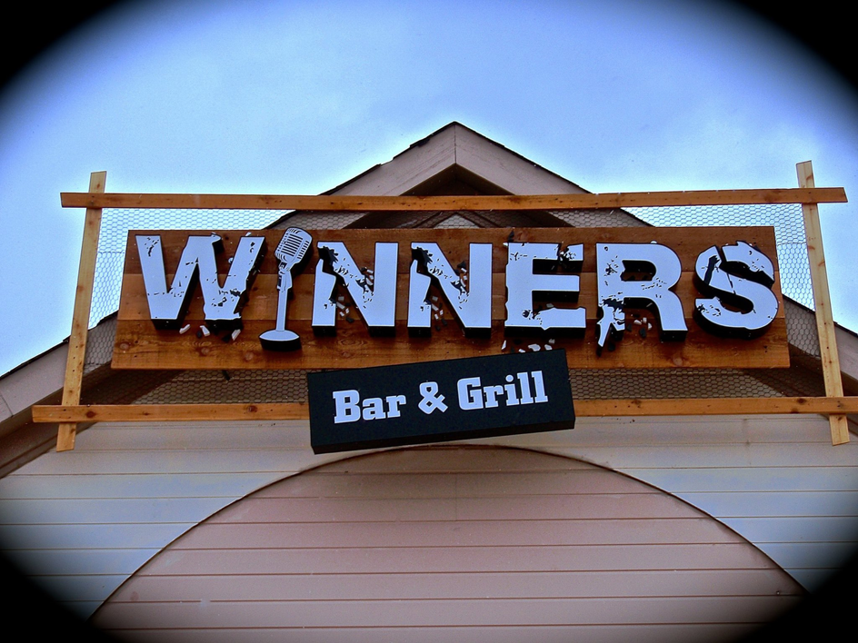 Outdoor commercial sign installation completed by Triad Construction Company LLC in Ashland City, TN.