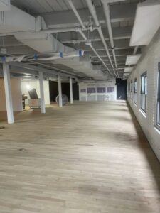 Commercial space under renovation with light hardwood floors by Diamond Flooring LLC in Boston, MA