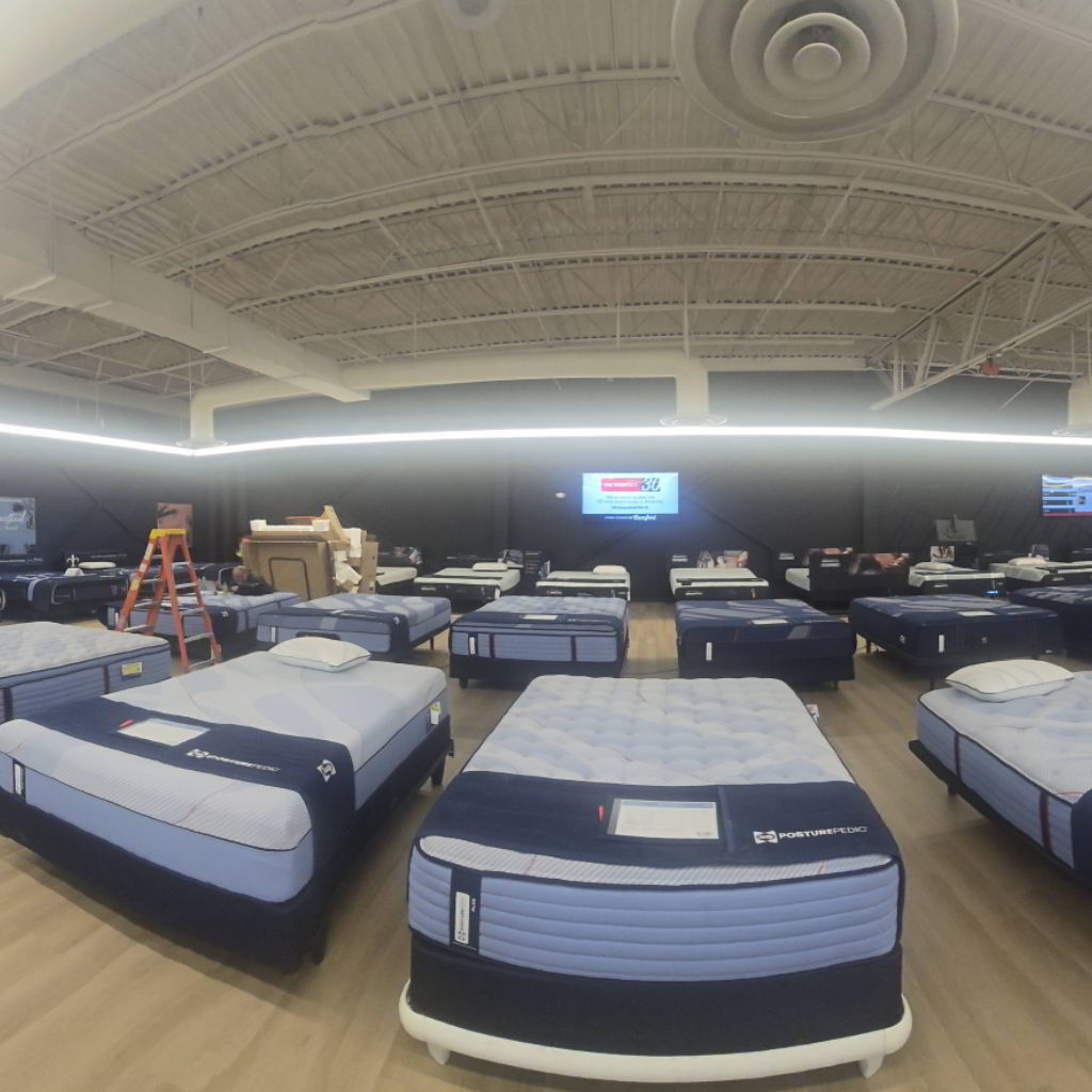 Handyman services for commercial store setup and installation by Mock-n-Son Inc. in Rio Rancho, NM, with a ladder and equipment visible.