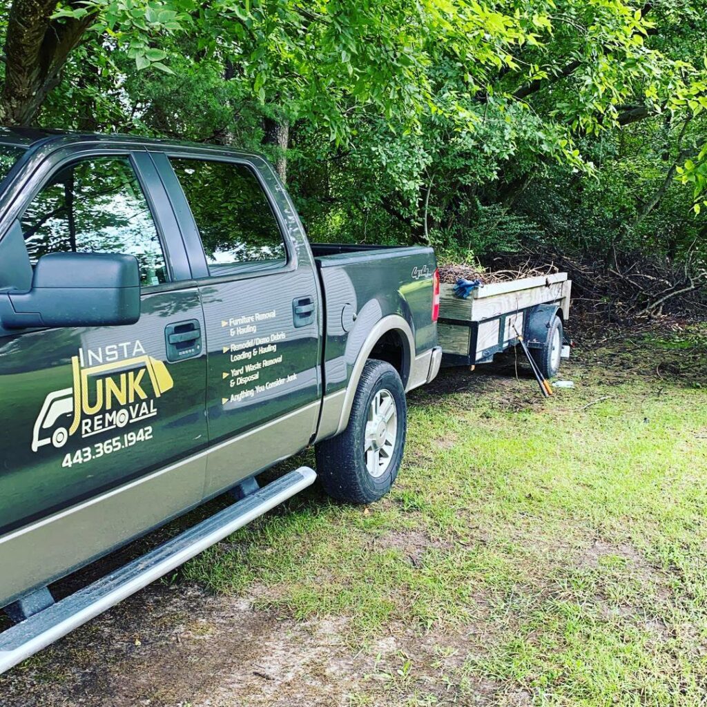 Insta Junk Removal & Demolition LLC truck with a trailer full of junk in Salisbury, MD