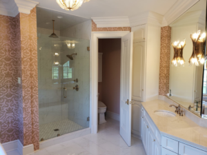 A complete bathroom renovation showing a new vanity and walk-in shower by Kenneth C. Bergeron, Architect in Pollock, LA.