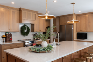 Complete kitchen renovation with new cabinets and island by Becker Home Improvement, Inc. in Cottage Grove, WI.
