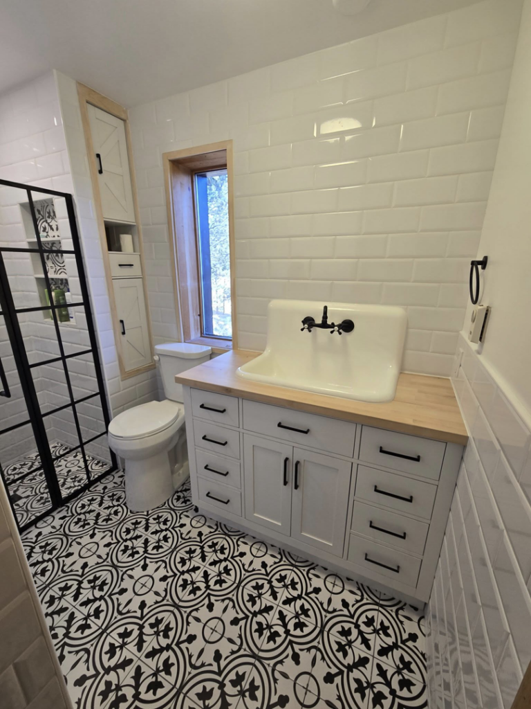 A beautifully completed bathroom remodel with new vanity, sink, and shower by All In Remodeling Services LLC in Arvada, CO.