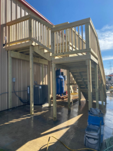 Completed commercial wooden deck and stairs built by JP Construction in San Antonio, TX.