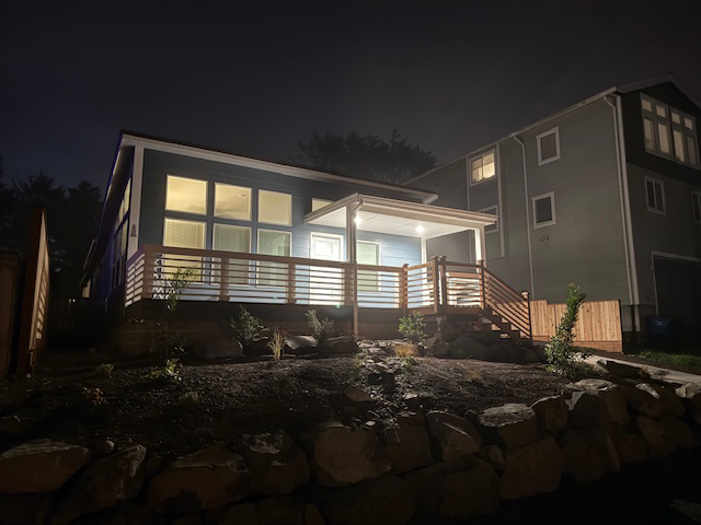 A beautifully completed deck, landscaping, and outdoor lighting project by United Property Improvement in Eugene, OR.