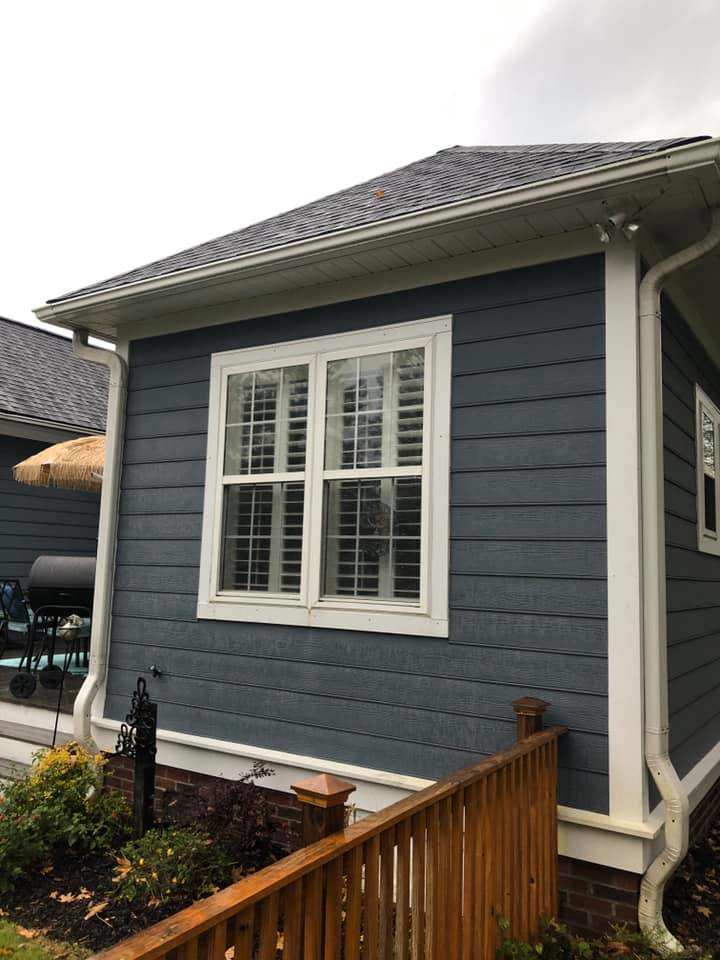 A completed exterior siding and gutter installation project on a house by American Shearing LLC in North Charleston, SC.