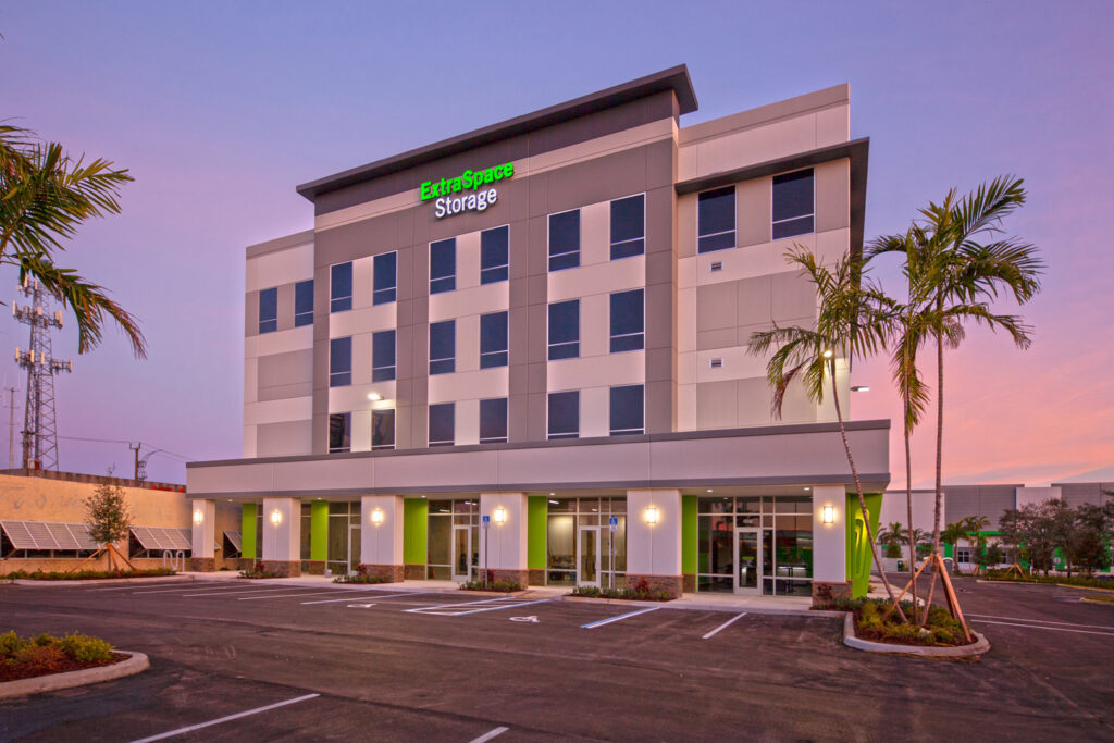 A completed ExtraSpace Storage facility with green accents, built by Hernandez Construction & Development in Fort Lauderdale, FL.