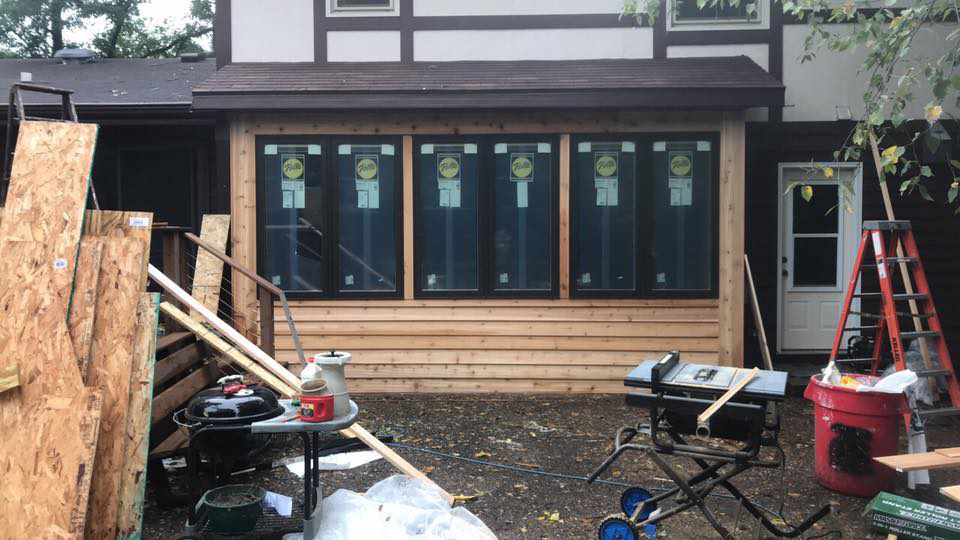 A completed home addition featuring new windows and siding installed by Gerlach Handyman in Eau Claire, WI.