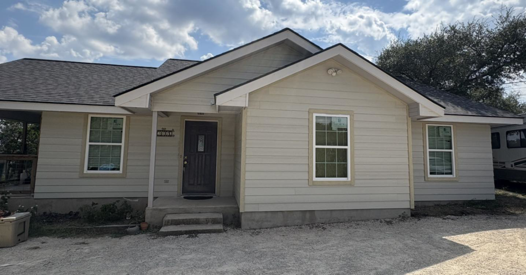Completed house exterior with new siding and roof by A. Romero Construction, a general contractor in Roanoke, VA.