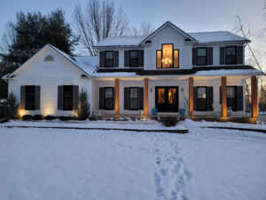 The completed exterior of a house after renovation, showcasing work by 1st Choice Windows in Canton, OH.