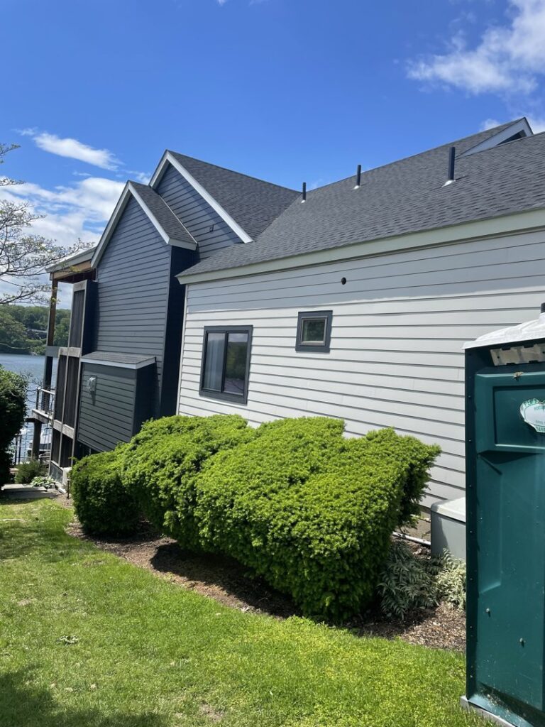 Completed house exterior with new siding and roof, showcasing work by LCM FRAMING LLC in Danbury, CT