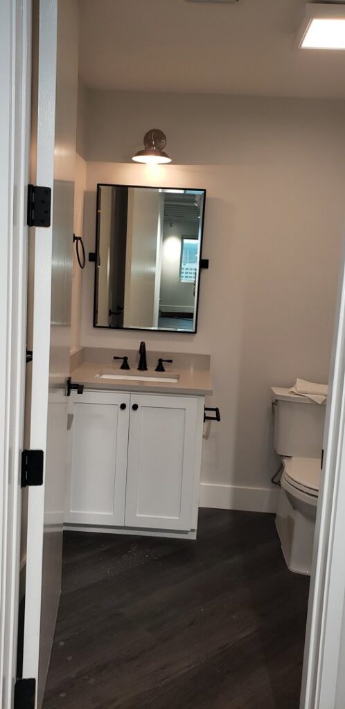 A beautifully completed modern bathroom renovation by Gourley Contractors, LLC, in Corpus Christi, TX.