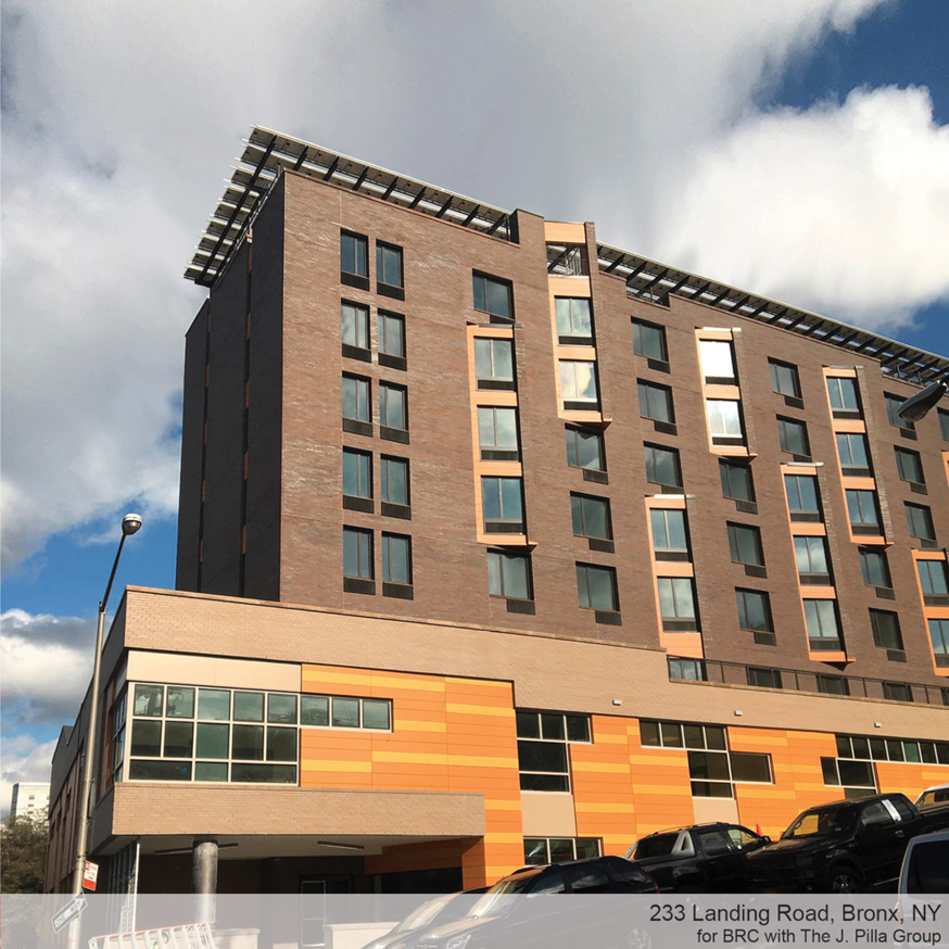 A newly completed multi-story building with solar panels on the roof by The J. Pilla Group Ltd. in The Bronx, NY.