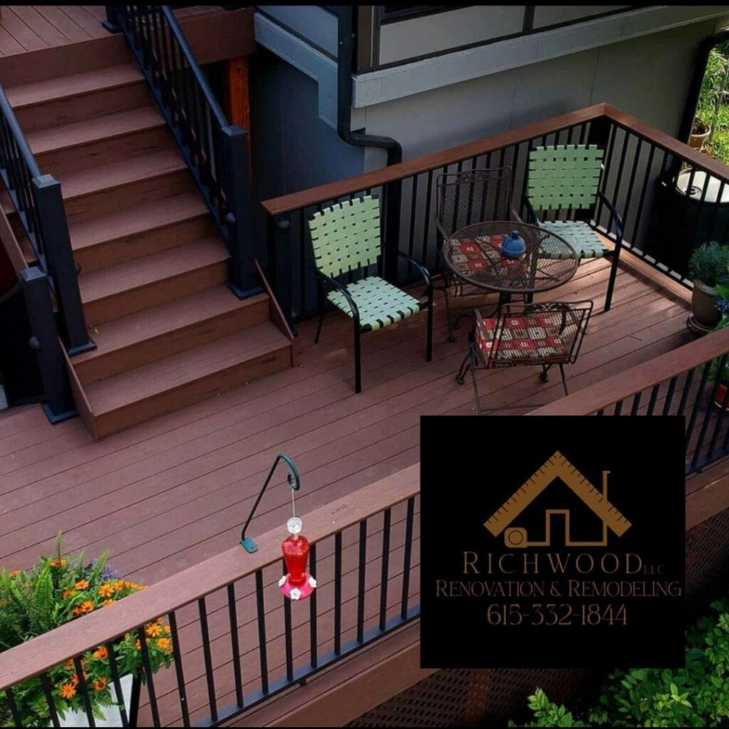 A beautifully completed outdoor deck featuring patio furniture and stairs by Richwood Remodeling & Outdoor in Nashville, TN.