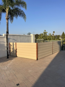 A newly completed outdoor patio privacy screen installed by Pauda Handyman in San Diego, CA.