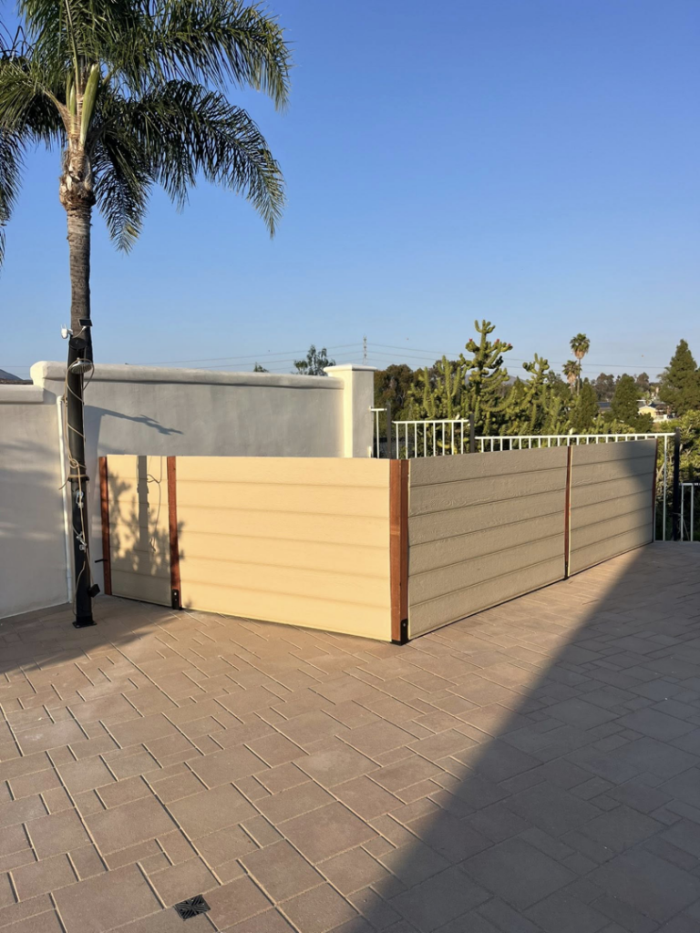 A newly completed outdoor patio privacy screen installed by Pauda Handyman in San Diego, CA.