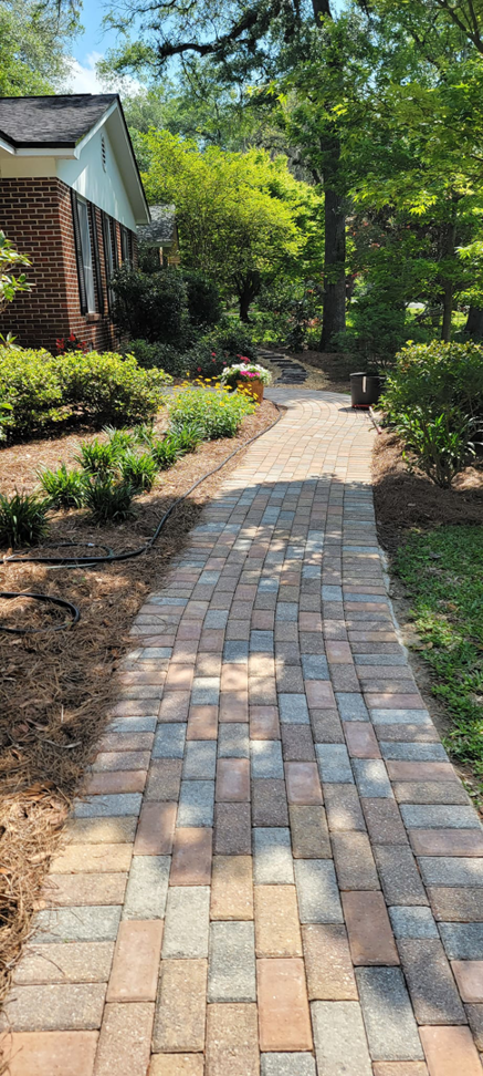 A beautifully completed paver pathway leading to a home, installed by Keystone Design in Tallahassee, FL.