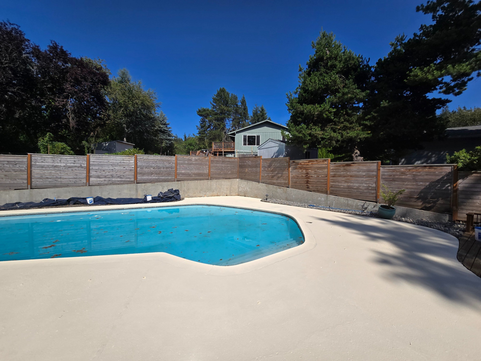 The completed pool deck renovation project, showcasing quality handyman work by Done Right Handy in Wilmington, DE.