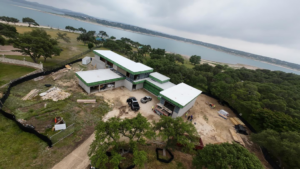 An aerial view of a completed residential roofing and landscaping project by Masota Construction in El Paso, TX.
