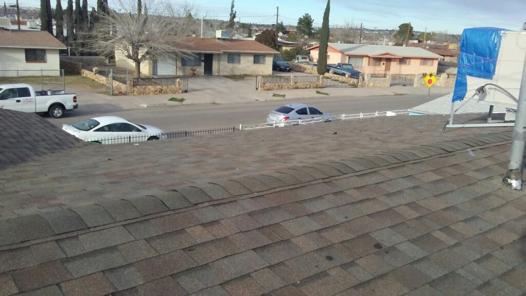 A completed residential shingle roof installed by Villalobos Remodeling & Construction in El Paso, TX