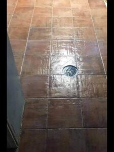 A newly completed shower floor tiling with a central drain, installed by MDJ Handyman in Salt Lake City, UT.