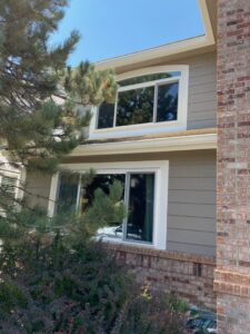 Completed window and siding replacement project by Colorado Window Solutions in Denver, CO.