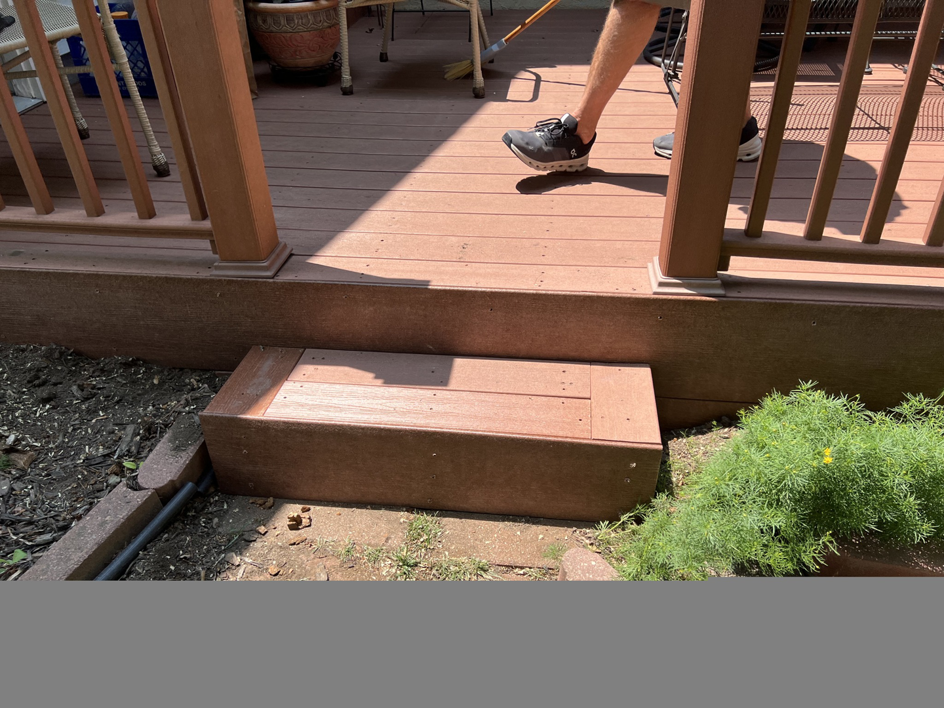 Detailed view of newly installed composite deck steps, demonstrating quality craftsmanship by Folmar's Handyman & Remodeling in Lincoln, NE.