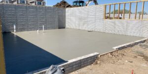 A newly poured concrete basement floor in a new construction project by Moons Concrete & Construction LLC in Chicago, IL.