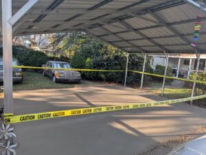 A newly poured concrete slab under a carport, showcasing work by Allen's Concrete Finishing in Rock Hill, SC.