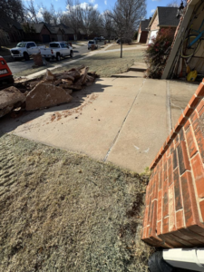 Broken concrete pieces from a driveway demolition project by JM Renovations LLC in Moore, OK.