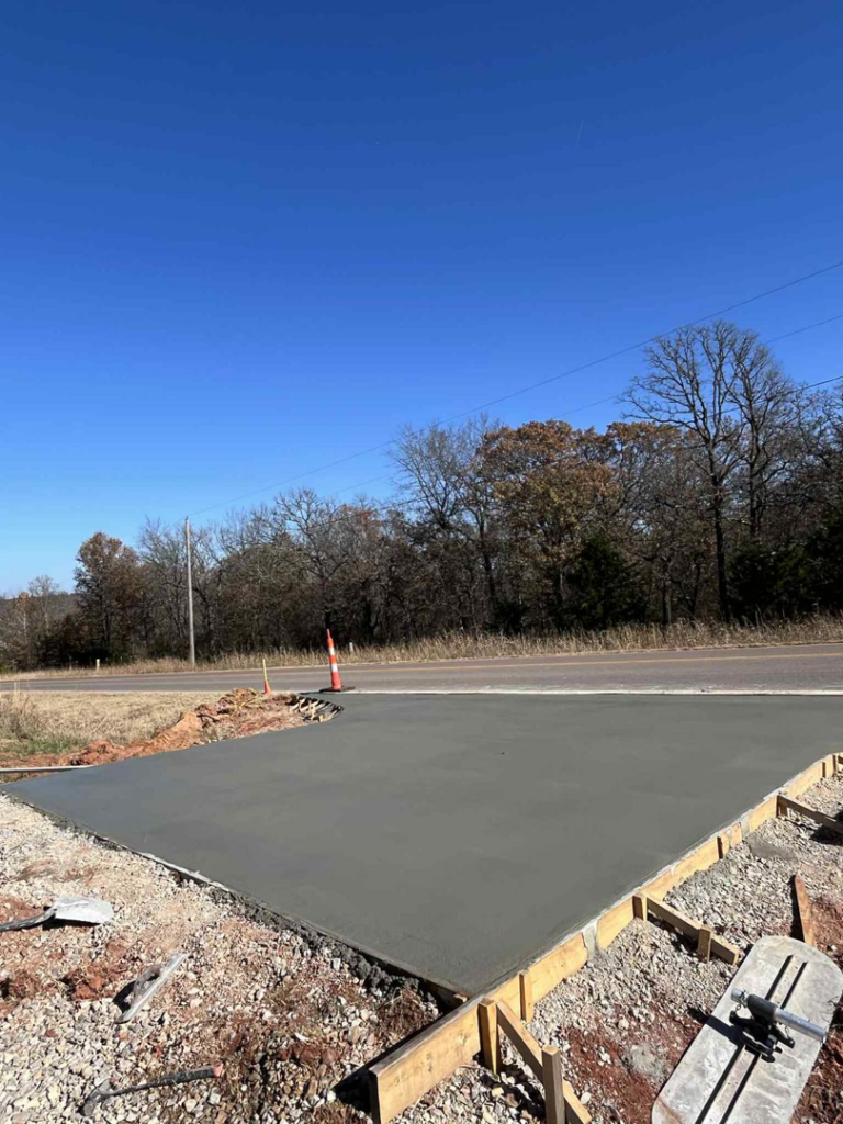 A concrete driveway entrance under construction with forms by Power concrete in Thousand Oaks, CA.