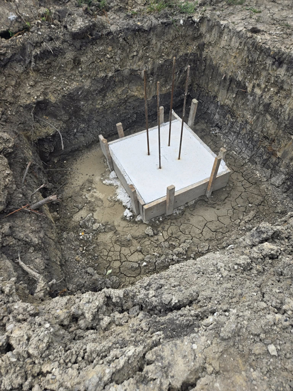 A concrete footing with rebar reinforcement for new construction by Specialized Building Services Inc., a general contractor in Chicago, IL.