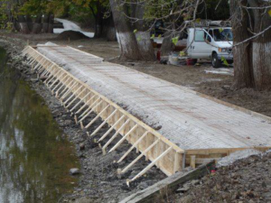 Concrete formwork for a new structure by the water, built by Central Illinois Construction Services Inc. in Effingham, IL