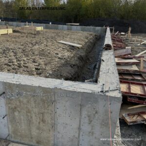 Detail of a concrete foundation wall under construction by Salas Enterprises, Inc in Elgin, IL