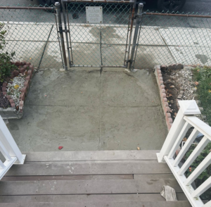 Freshly repaired and installed concrete path by Spotless & Handyman, LLC in Brockton, MA.