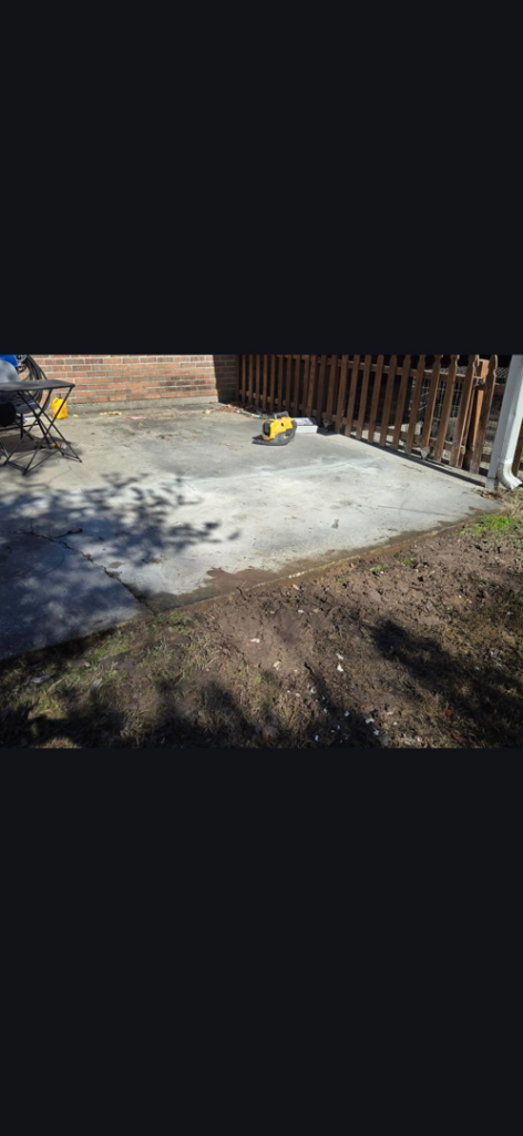 A concrete patio repair work site with equipment by Gulf Coast Foundation Solutions in Lafayette, LA