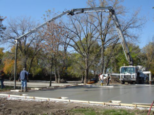 A concrete pump truck pouring a large slab for Central Illinois Construction Services Inc. in Effingham, IL
