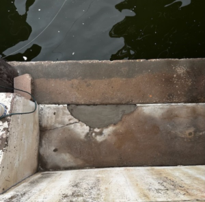 A freshly patched concrete seawall repair by Complete Foundation Repairs in Corpus Christi, TX.