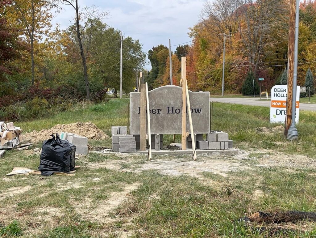 Construction of a concrete "Deer Hollow" sign, a hardscaping project by Inspired Renovation & Hardscape's in Lorain, OH.