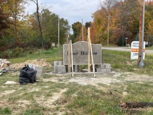 Construction of a concrete "Deer Hollow" sign, a hardscaping project by Inspired Renovation & Hardscape's in Lorain, OH.