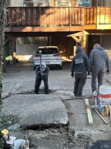 A construction crew from MCG General Contractor performing concrete demolition work in Philadelphia, PA.
