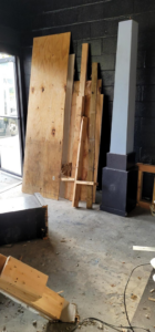 Construction debris and wood materials stacked for removal during a cleanout by P and P Junk Removal and Demolition in Norfolk, VA.